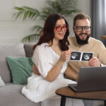 Happy couple annoucing IVF pregnancy